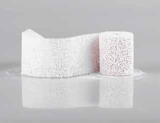 A layer of natural plaster is applied to a textile carrier. The bandage requires short time of soaking; setting time is about 8 minutes.