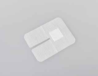 is a sterile nonwoven dressing for fixation of intravenous cannulas with ports. It has an absorbent pad that protects the puncture site. It also contains an additional pad under the cannula s wings.