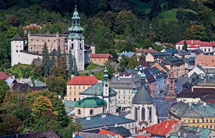 mestský znak. Mesto ležiace na svahoch kopcov nazývaných Glanzenberg a Paradajz sa stalo prvým baníckym mestom na Slovensku.