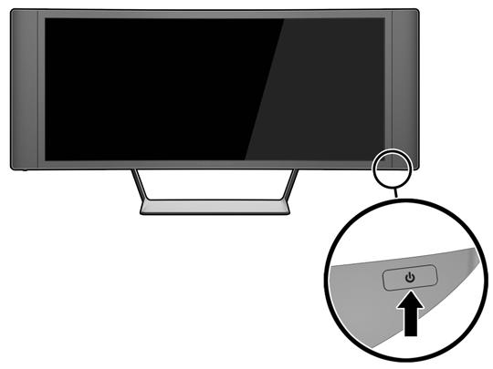 3. Stlačením tlačidla napájania nachádzajúcim sa pod pravým reproduktorom zapnite monitor.